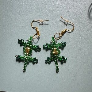 Homemade alligator beaded earrings